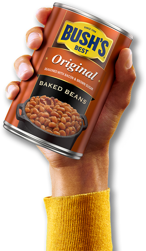 Hand holding up a can of Bush's Original Baked Beans
